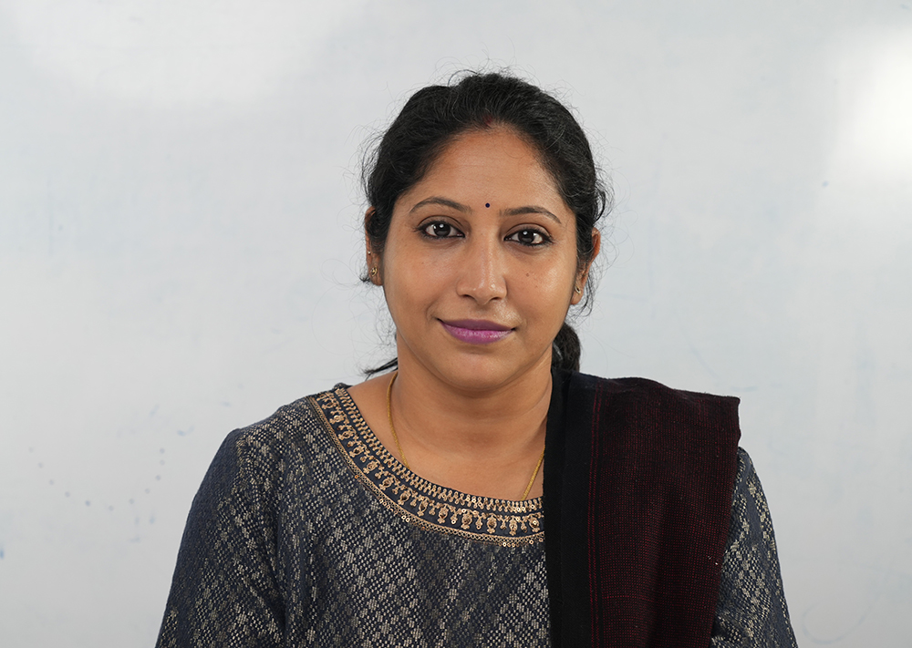 Dr. Mili Kar